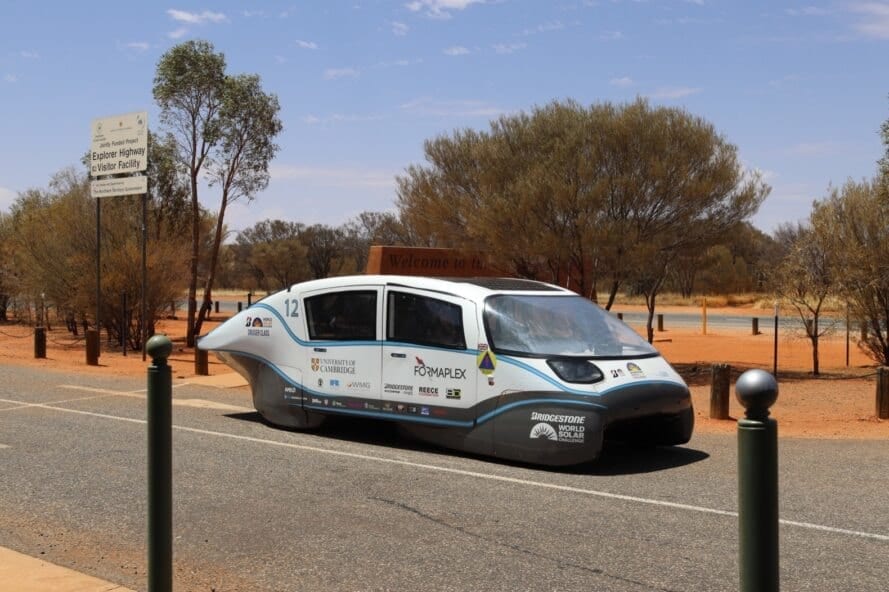 low-lying white electric car