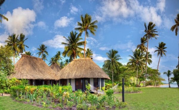 hotel huts with thatched roofs