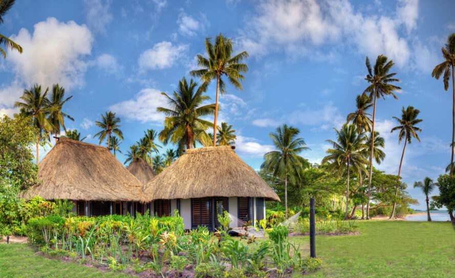 hotel huts with thatched roofs