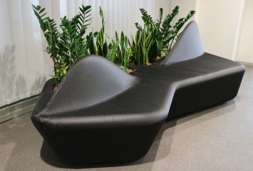 3D-printed black couch made from recycled plastic