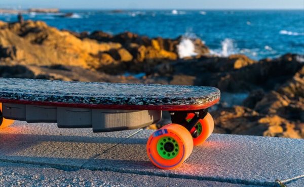 skateboard with bright orange wheels